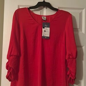NWT CAbi red Aurora Blouse. Stunning red color with ruched sleeves.